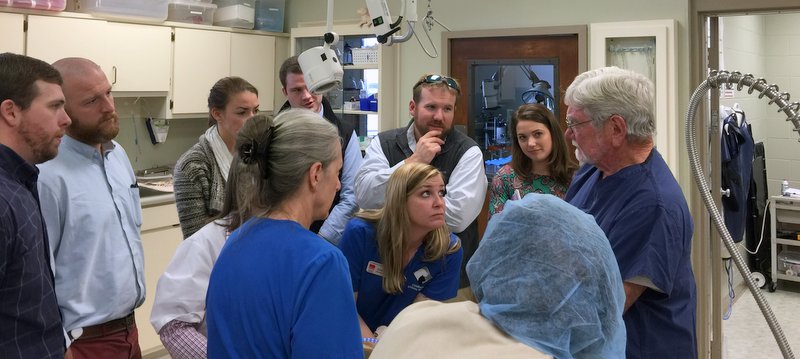 Dr Horne Orthopedic surgeon speaking to senior Aurburn students at Companion Animal Hospital, Phenix City, AL